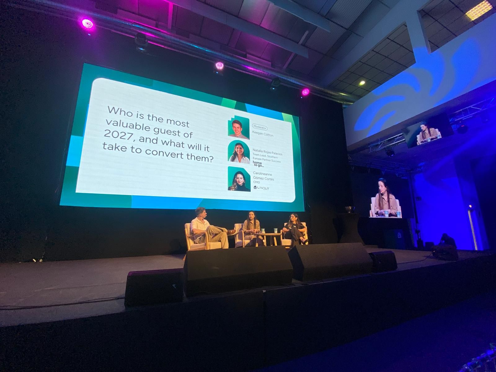Livily CMO speaking on a conference panel about the guest of 2027